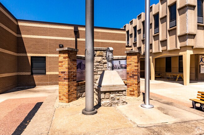 Douglass Elementary School monument on display on school grounds in Kansas City.