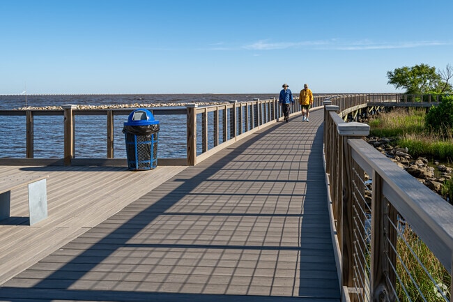 Enjoy a walk along the Bucktown Marsh Boardwalk at the Bucktown Marina.