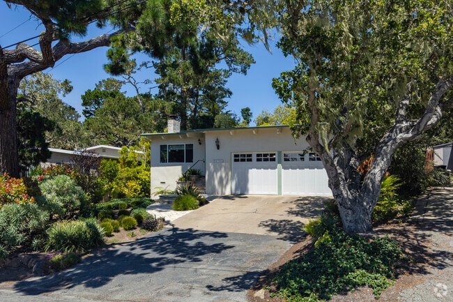 The setting in Carmel-By-The-Sea, California is perfect, trees, to lush yards they have it all.