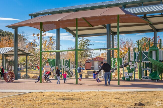 Families can enjoy the playgrounds in Sunset Park.