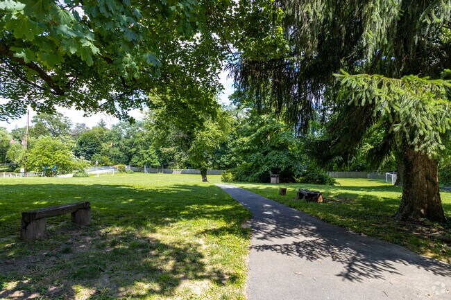 Shady green trails lead students to the multipurpose field at Crefeld School.
