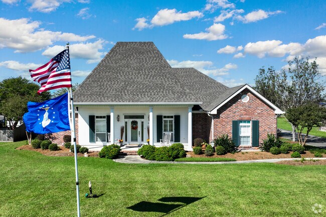 Beautiful acadian-style home in a gated community in The Lakes.