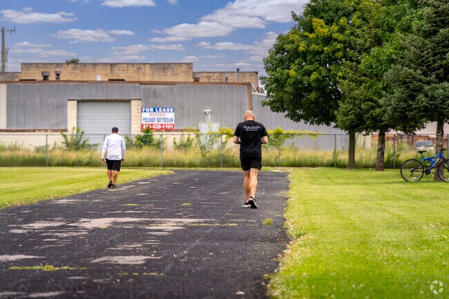 Locals get their daily exercise at the track at Anthony Park.