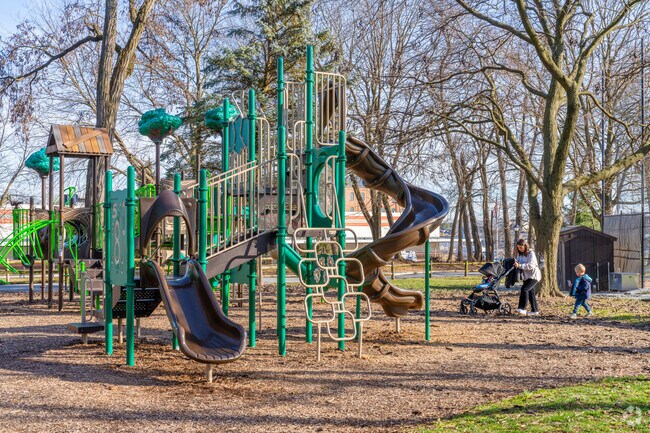 Families take their children to the playground at Stauffer Park for a thrilling time.