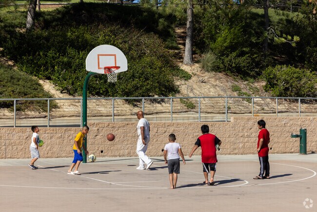 This family enjoying a game of hoops at Sunset Park in Palomar Estates.