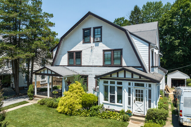 Twin homes also exist in Newtown Square such as this Dutch colonial style.