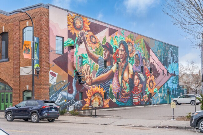 A motivational Mural on the side of the Project for Pride In Living Career Center.