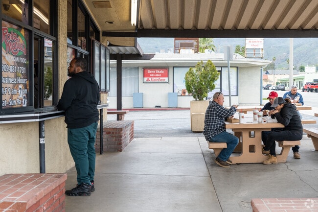 Order at the window and enjoy the meal under the covered patio at Rosa Maria’s Drive In