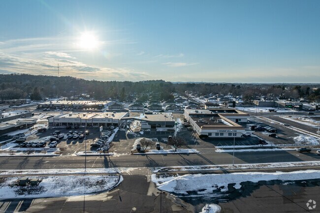 Regis Catholic Schools is located near a shopping center.