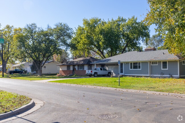 Ranch-style homes in Sherwood Glen feature mature trees and classic midcentury design.