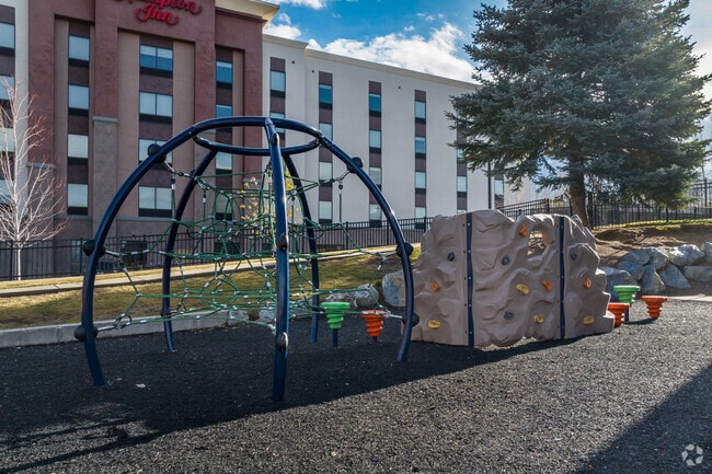 Climbing toys at Intermountain Christian School offer students fun ways to exercise outside.