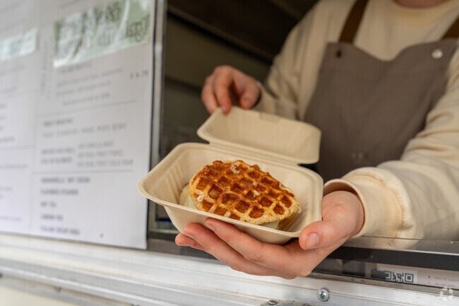 Caples Waffles & Espresso serves espresso drinks alonside their delicios waffle breakfast sandwich.