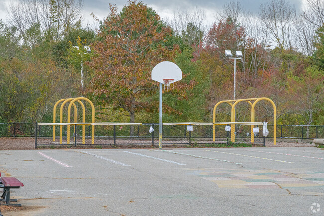 There is a basketball court and open play area at Naquag Elementary School