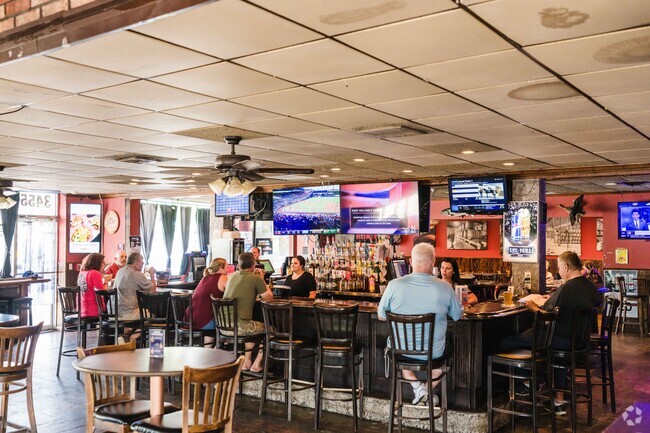 Speakeasy Grill near Pine Hill is one of the highest rated restaurants in the area.