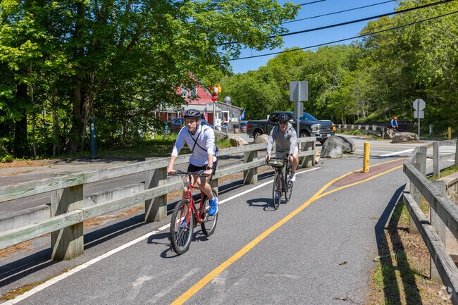 Cyclists can enjoy the Cape Cod Rail Trail in East Harwich.
