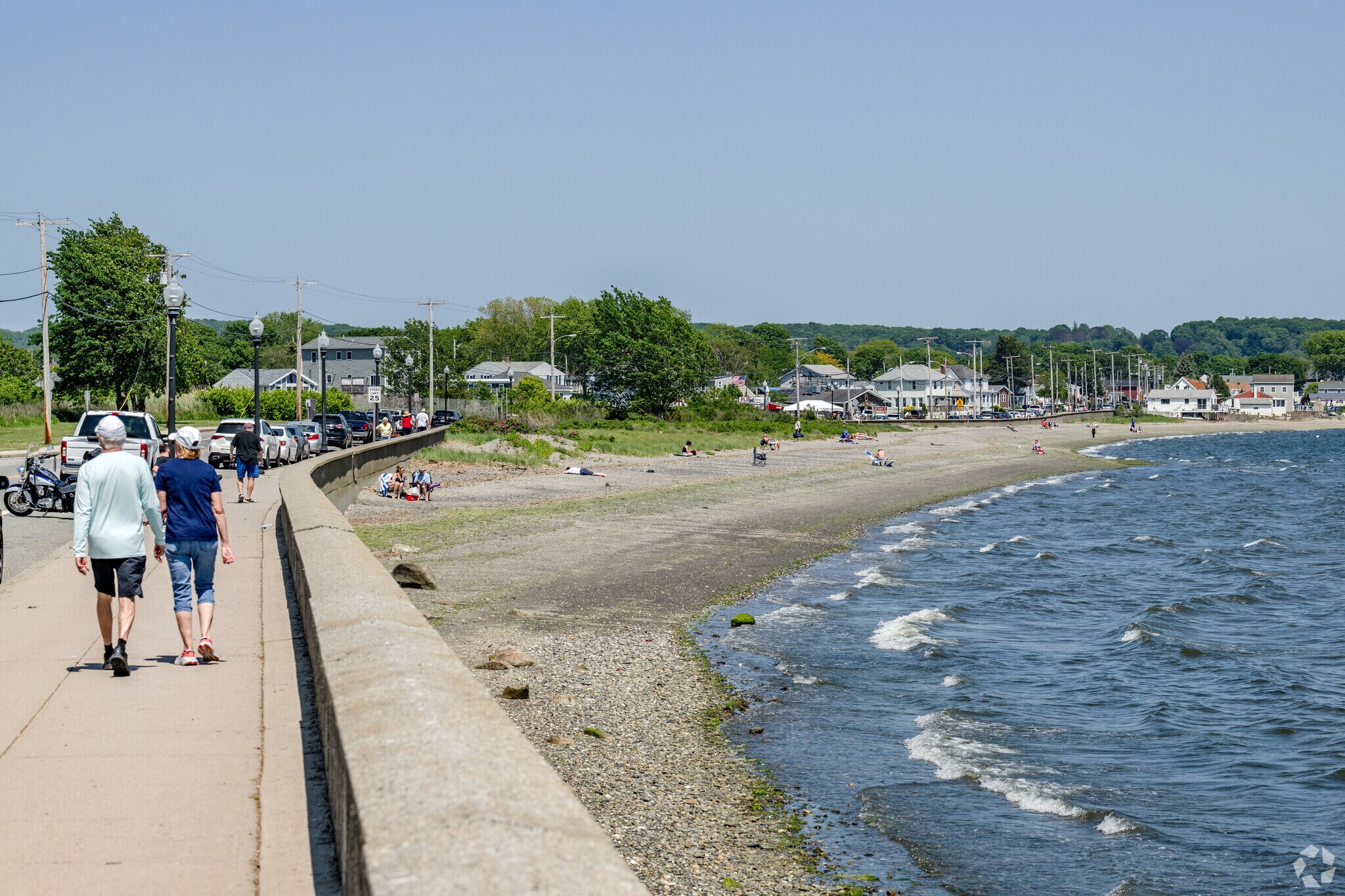 Sunbathing or strolling, the beach in the Island Park neighborhood is a great place to be.