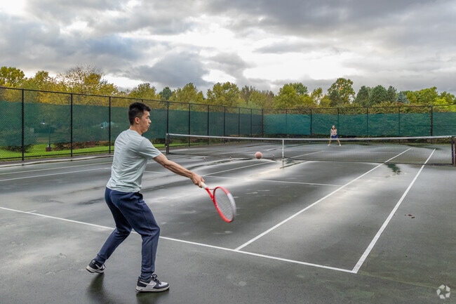 Orchard Park has two full sized well maintained tennis courts for residents to play on.