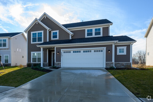 A newly built home sits agains the sun in a developnment of Northeast Ft. Wayne.