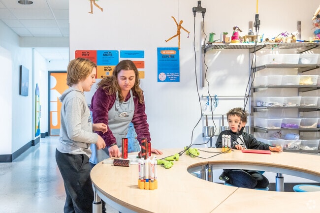 Kids build using recycled materials at the Explore Children's Museum near Shonas Highlands.