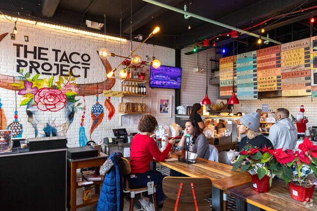 The Taco Project in Northwest Yonkers features a vibrant, colorful interior.