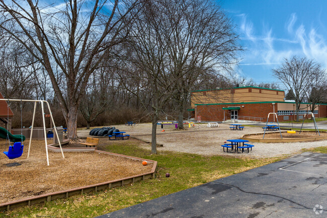 Playgrounds fill with laughter at John Hole Elementary School.