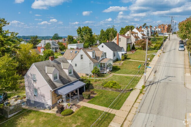 Beautiful Cape Cods with Dormer windows outline the streets of Bon Air overlooking Pittsburgh.