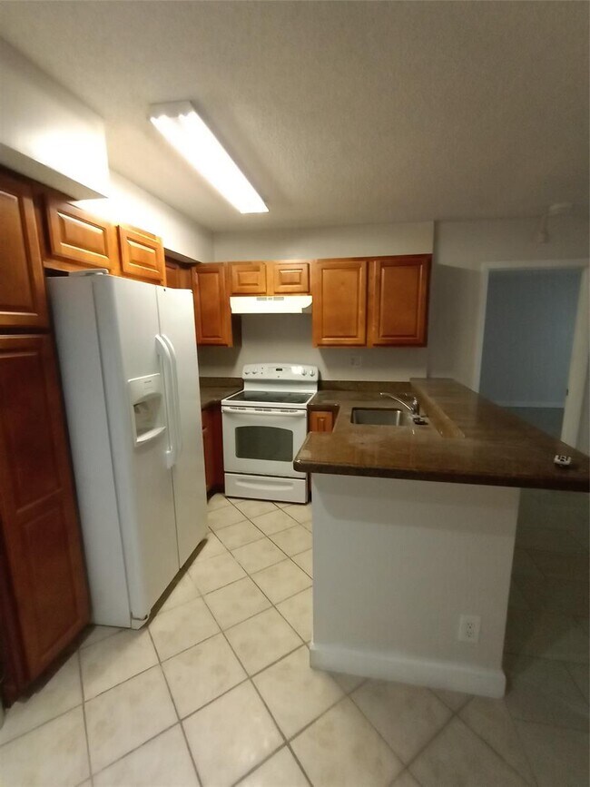 751 Lyons Rd, Coconut Creek, FL 33063 - photo 2