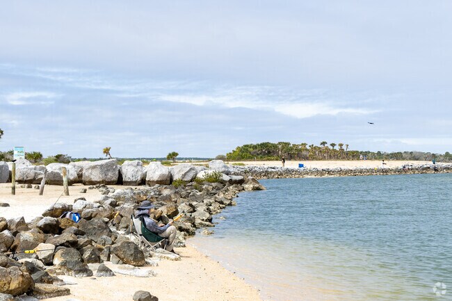 Locals enjoy fishing in the inlet at Butler and Crescent Beaches.