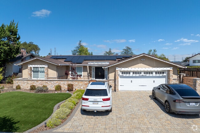 This single-story ranch home in Almaden Meadows offers a spacious layout and beautifully manicured yard.