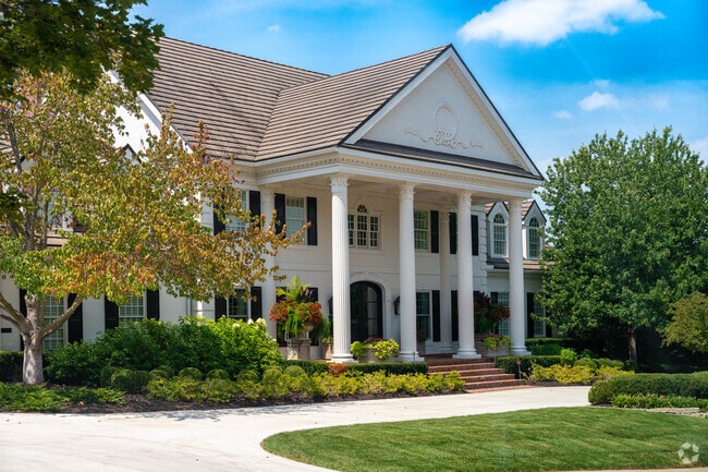 Large colonial revival homes can be found in Leawood.