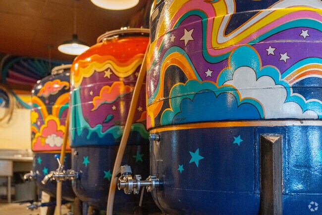 McMenamins, an iconic Portland chain that changed the drinking laws in Oregon, allowing eateries to sell beer brewed on-site. You can watch the magic as you dine at McMenamins Oak Hills Brewpub.