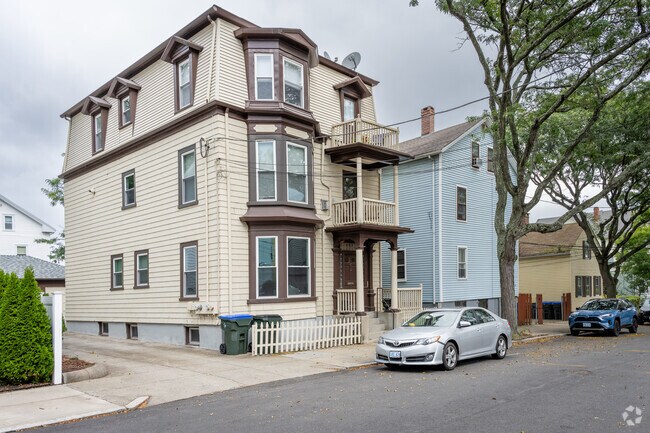 Stroll through Fox Point, RI, to see its elegant multifamily Victorian homes.