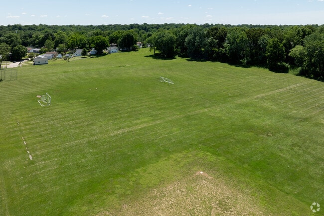There are large athletic fields behind the Hoech Middle School building.