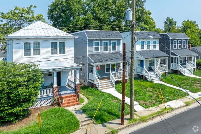 A row of new traditional homes on Carolina Ave in East Highland Park.