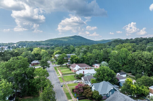 Tree-lined Anniston streets feature sidewalks and welcoming front yards.