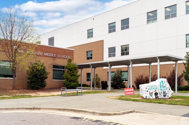 Pine Hollow Middle is home to the Pilots and is near RDU Airport.