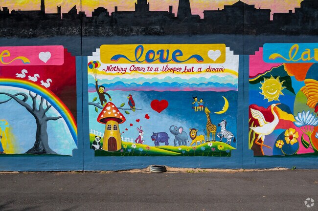 Numerous colorful murals decorate free space in the Deanwood neighborhood.