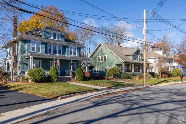 These magnificent homes rest on the shores of Fulton Pond in Mansfield.
