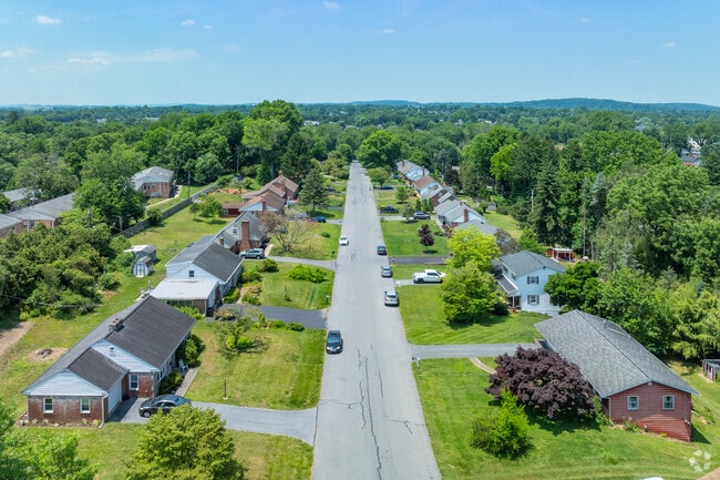 Though some neighborhoods don't have sidewalks, they still offer lots of green space and peace.