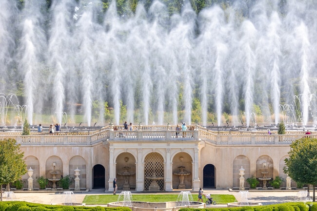 Watch from the conservatory overlook as fountains create art.