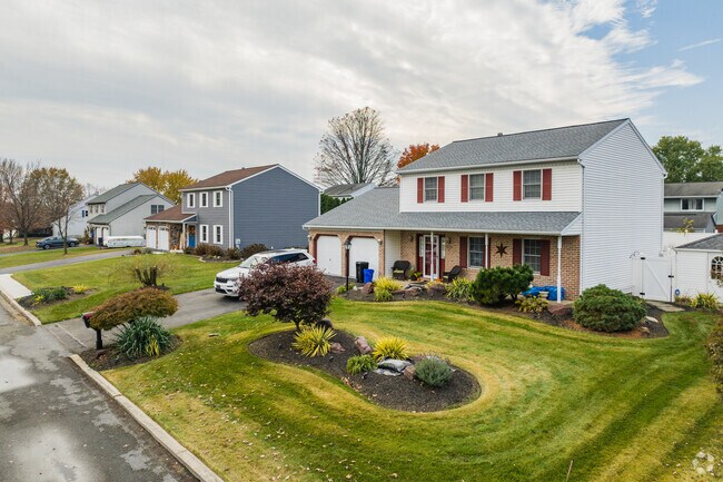 Discover the warmth and charm of colonial living in this inviting Hamburg residence.