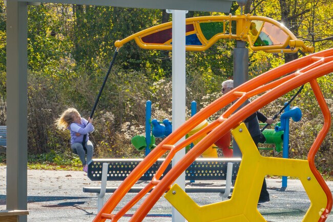 Explore Youngs Creek Parks outdoor space, trails, open green areas and scenic creekside.