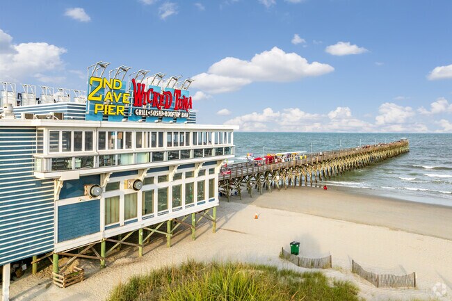 Wicked Tuna restaurant is on the beach with a fishing pier in Downtown Myrtle Beach.