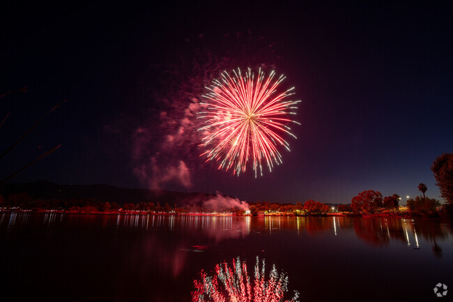 Pierce Ranch residents enjoy 4th of July fireworks lighting up the sky over Almaden Lake Park nearby.