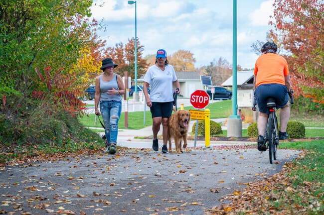 Bikers and walkers enjoy a sunny day on Fort Wayne's Pufferbelly Trail.