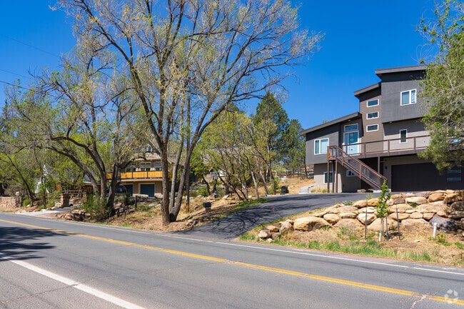 Modern multistory homes are in the hills of the Broadmoor neighborhood.