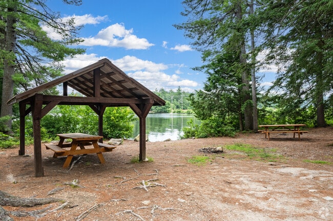 The sheltered picnic area on Sabatis Island is perfect for family lunches in Bridgton.