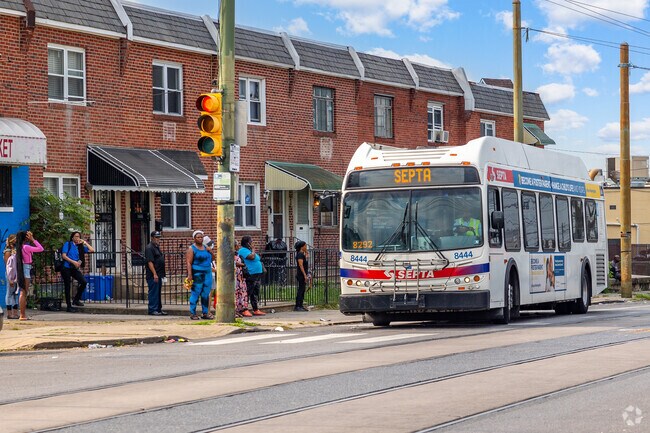 Travelers hop on a SEPTA bus in Paschall to navigate the streets of Philadelphia.