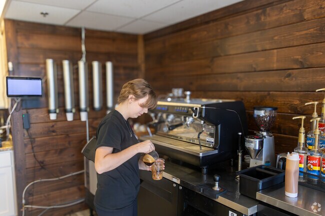 The Grind coffee shop serves espresso and pastries on Main Street.