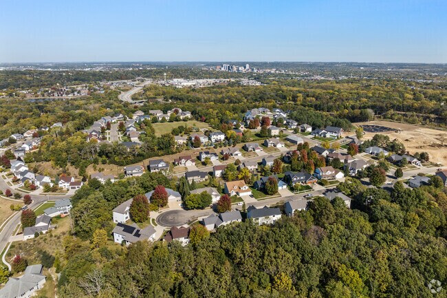 Pine Ridge offers quiet suburban streets with scenic greenery and nearby city access.